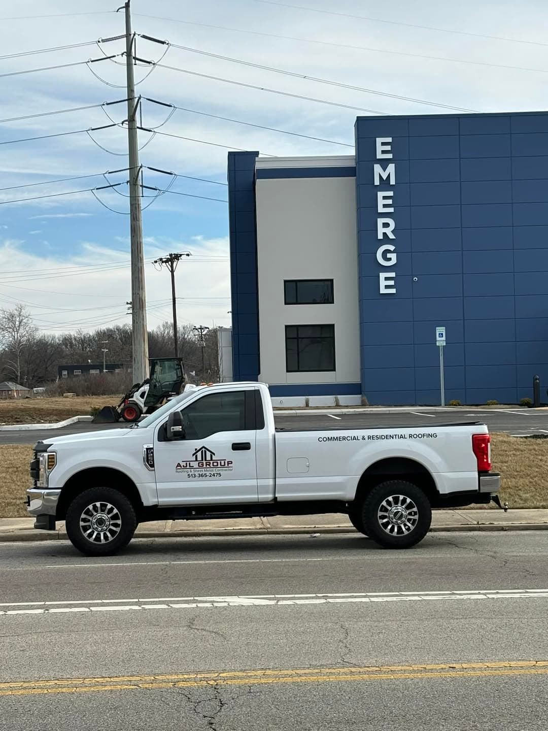 AJL Group truck at the Emerge commercial building
